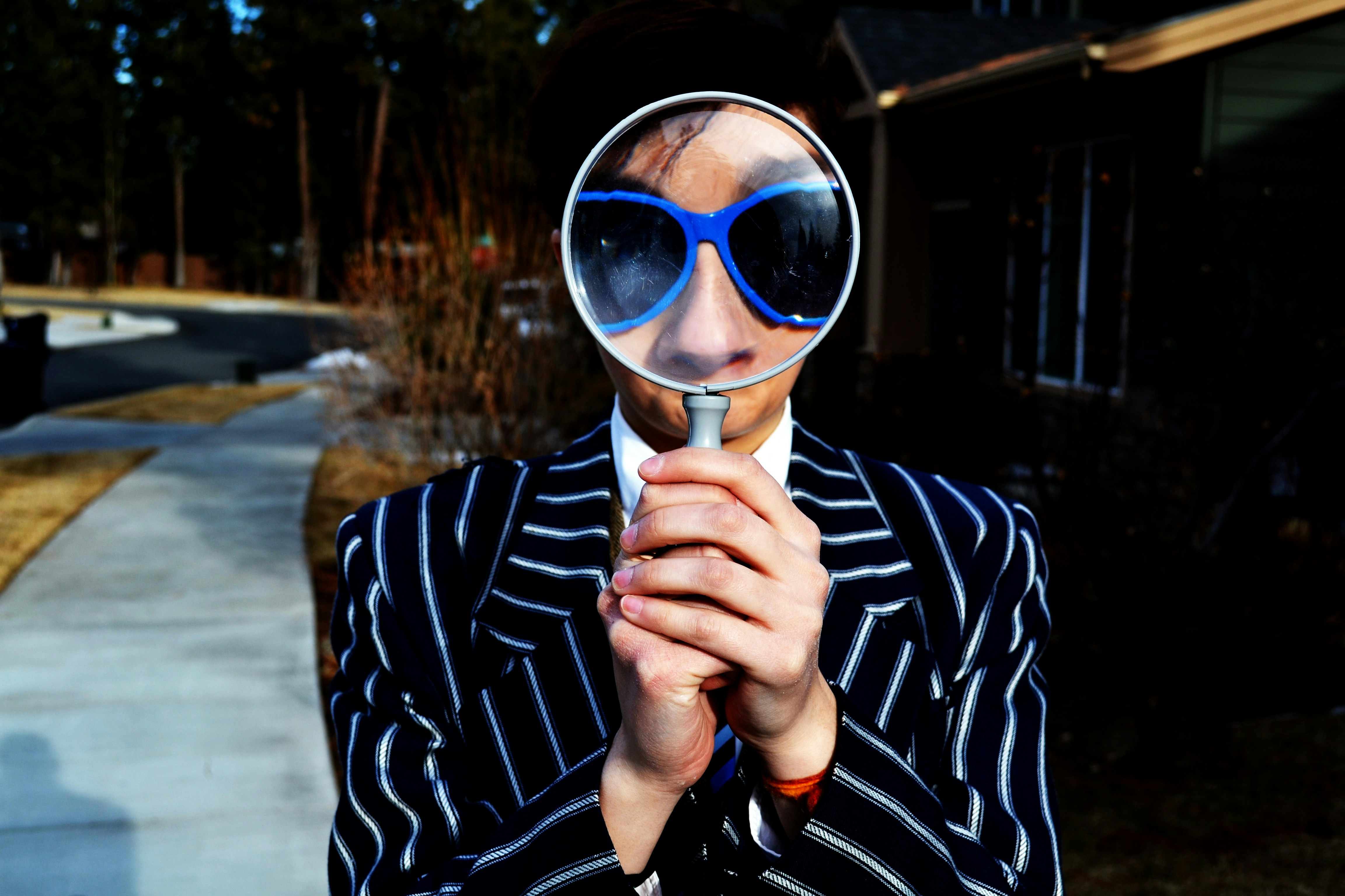 looking through a magnifying glass for job search and career growth